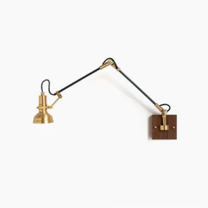 Kane Swing Arm Wall Lamp in brass and walnut wood, front view studio photography