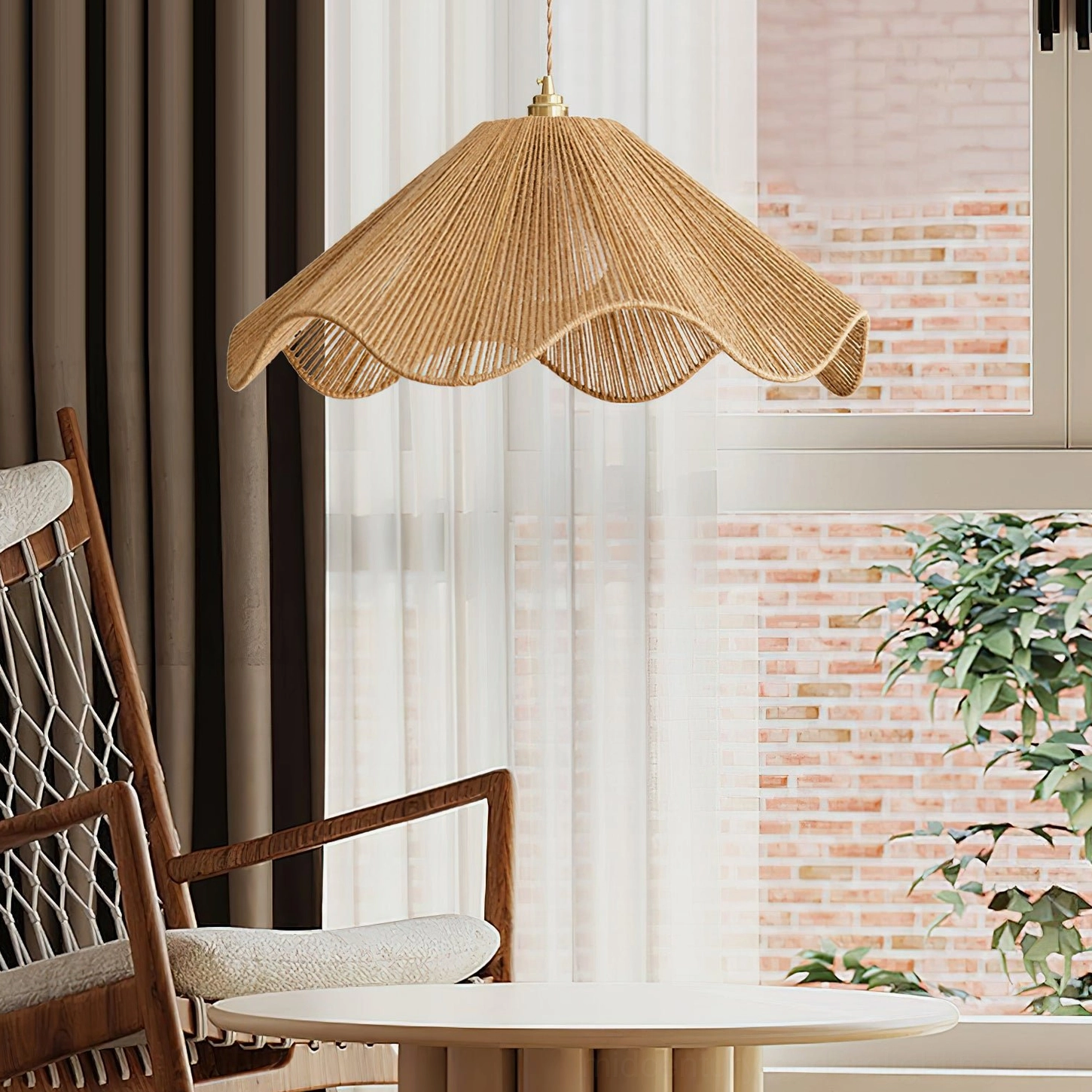Karai boho pendant light with organic scalloped edge installed in residential lounge with natural window light and wooden furniture
