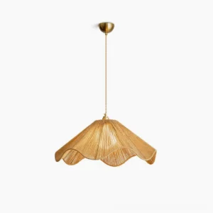 Karai handwoven hemp rope pendant light with scalloped wavy shade and brass-toned metal hardware, overhead front studio view