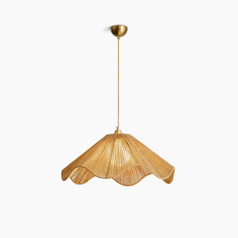 Karai handwoven hemp rope pendant light with scalloped wavy shade and brass-toned metal hardware, overhead front studio view