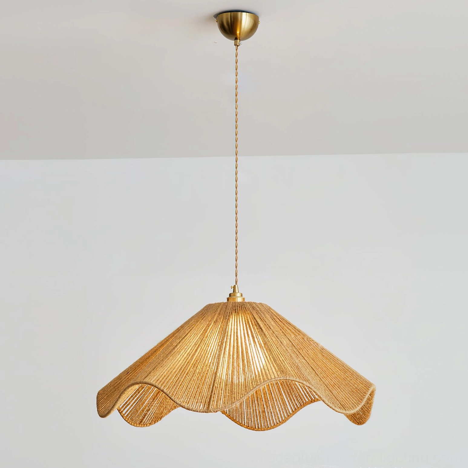 Karai mid-century modern hemp pendant light hanging detail showing brass-toned hardware and organic rope texture