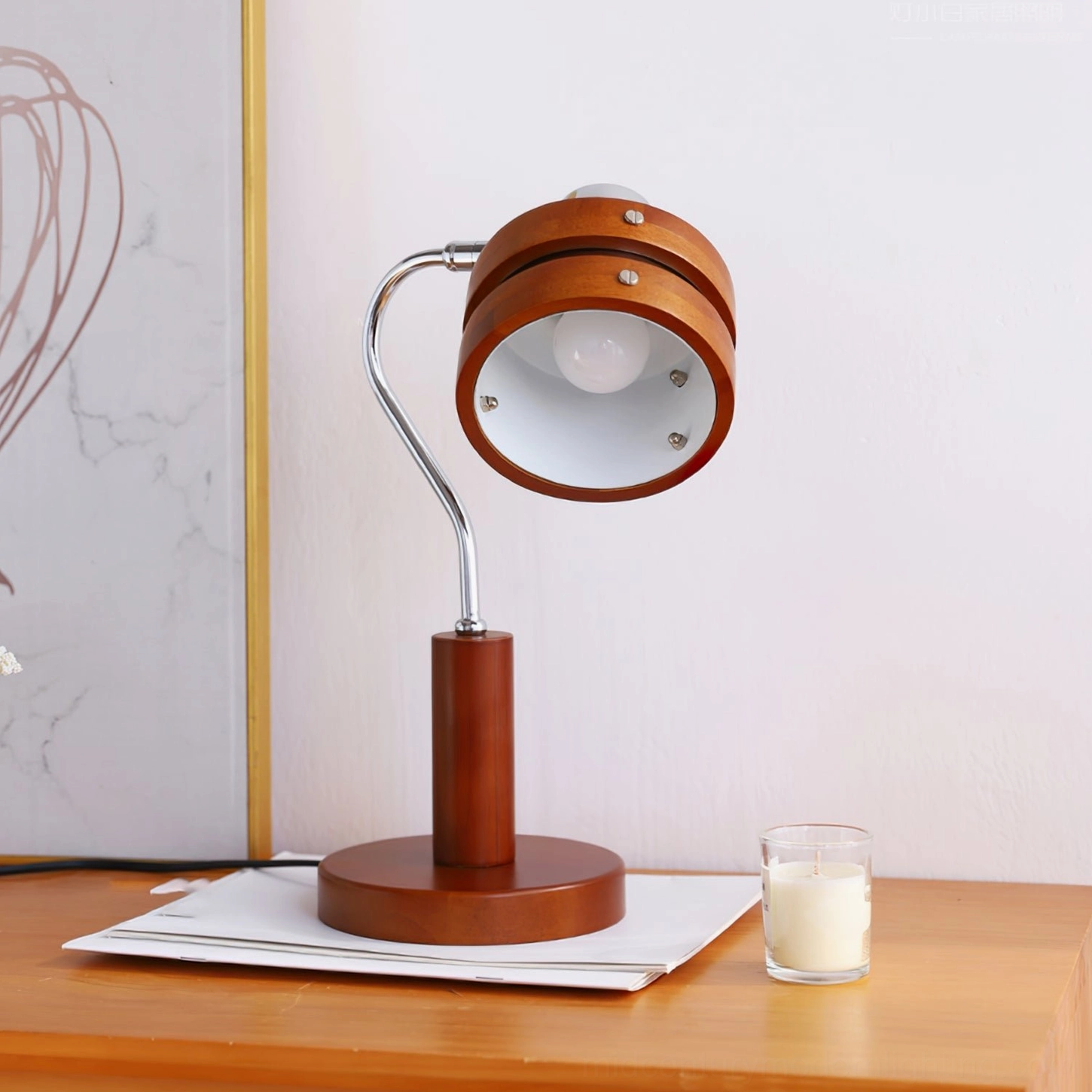 Karry swivel head table lamp showcasing adjustable metal articulation and design functionality