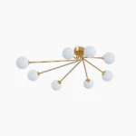 Kaspa brass sputnik ceiling lamp with 5 frosted white glass globe shades, top-down flat lay view on white background