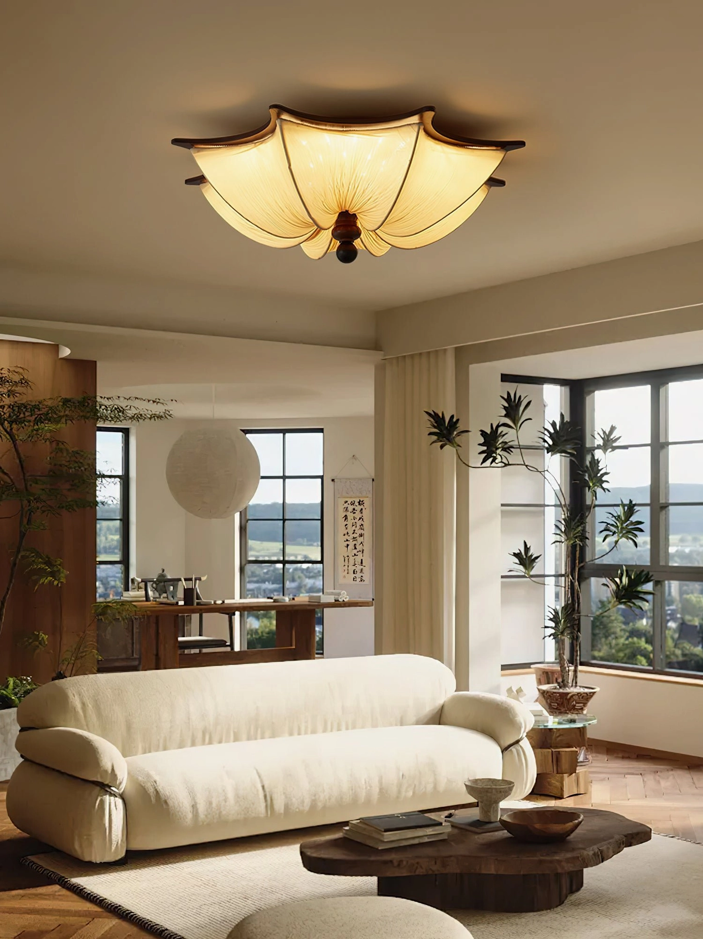 Kateo lotus ceiling lamp in minimalist living room with plush seating and indoor green plants