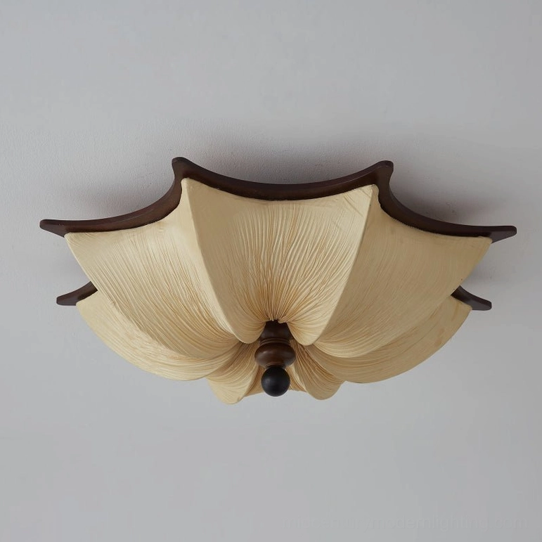 Kateo fabric ceiling light fixture side-front detailed view showing hand-pleated beige shade and walnut wood construction