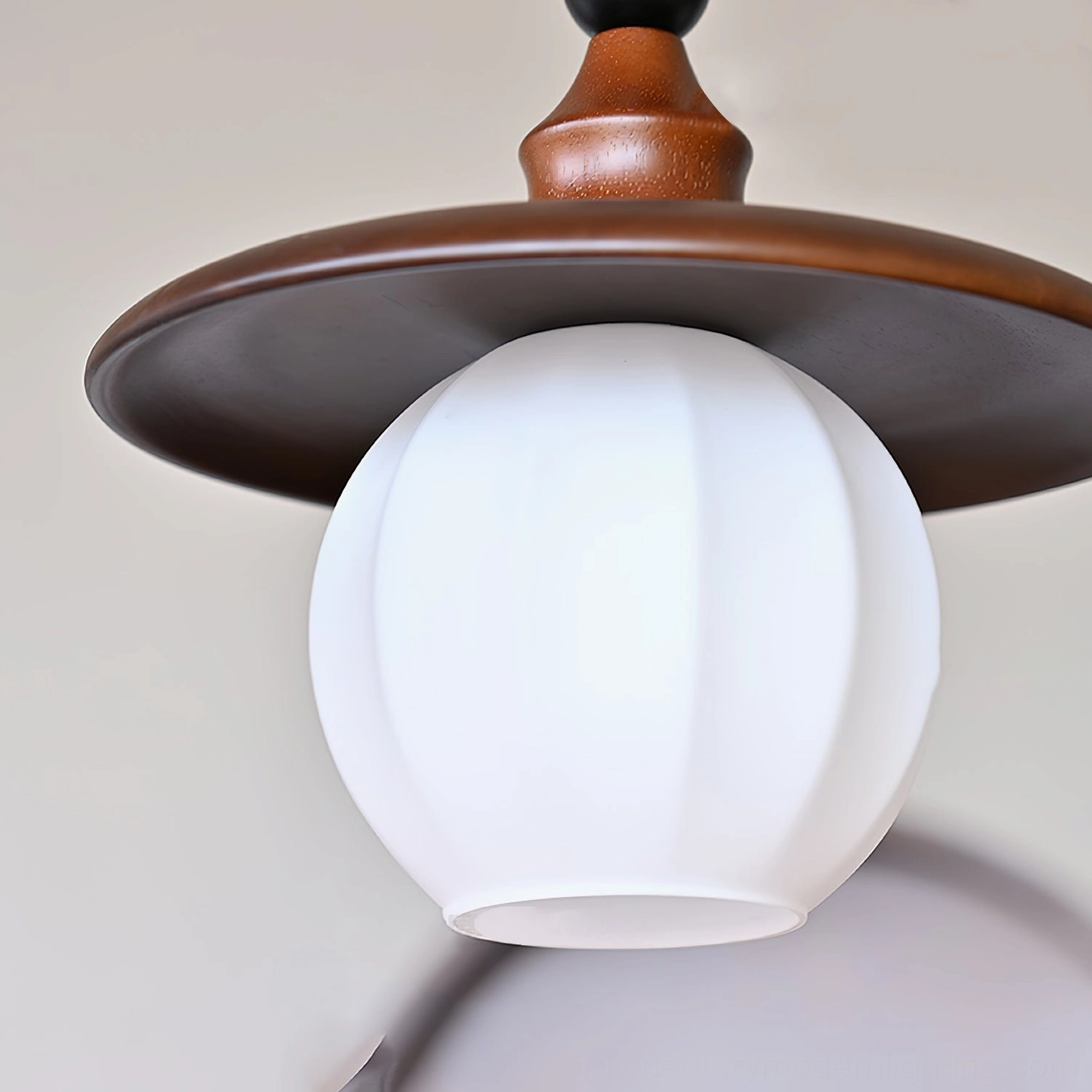 Kato 3-light linear pendant configuration in living space, multiple shade arrangement