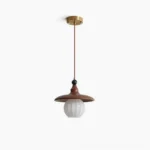 Kato mid-century modern pendant light with walnut metal shade and ribbed glass globe, studio front view