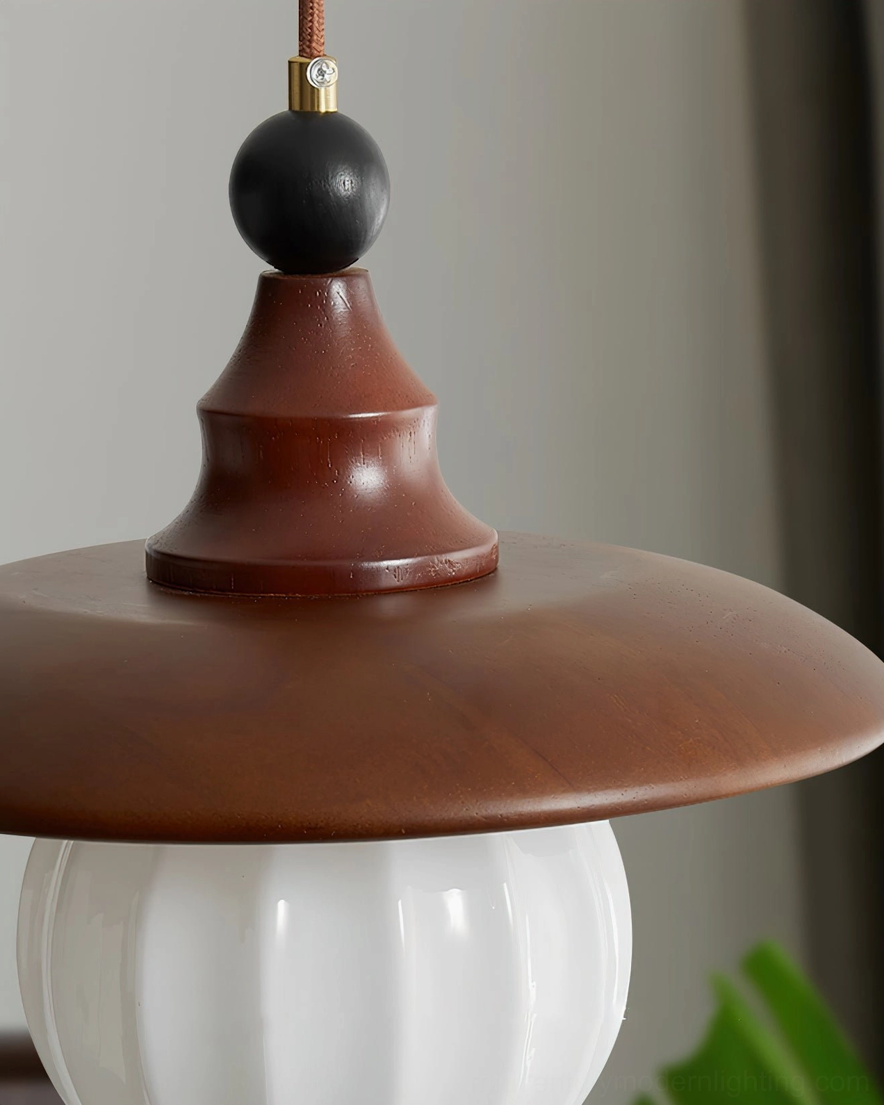 Kato pendant light close-up of walnut metal frame and brass ceiling mounting detail