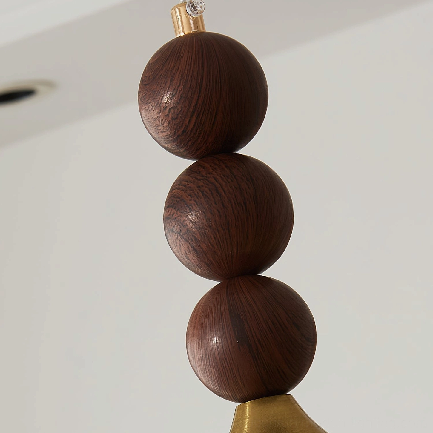 Kaydan pendant lamp showing metal hardware and glass diffuser in detail
