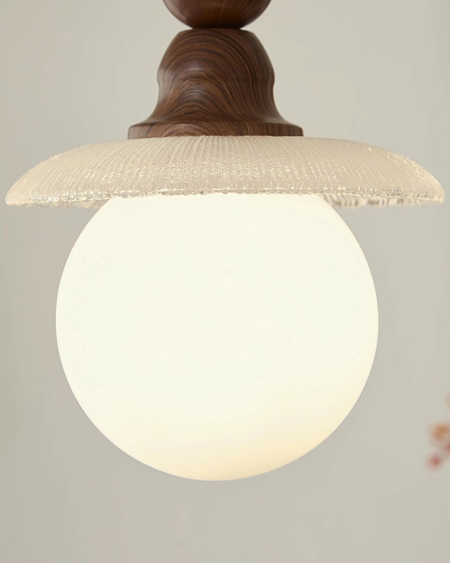 Kaydan mid-century modern pendant light in warm interior lighting scene