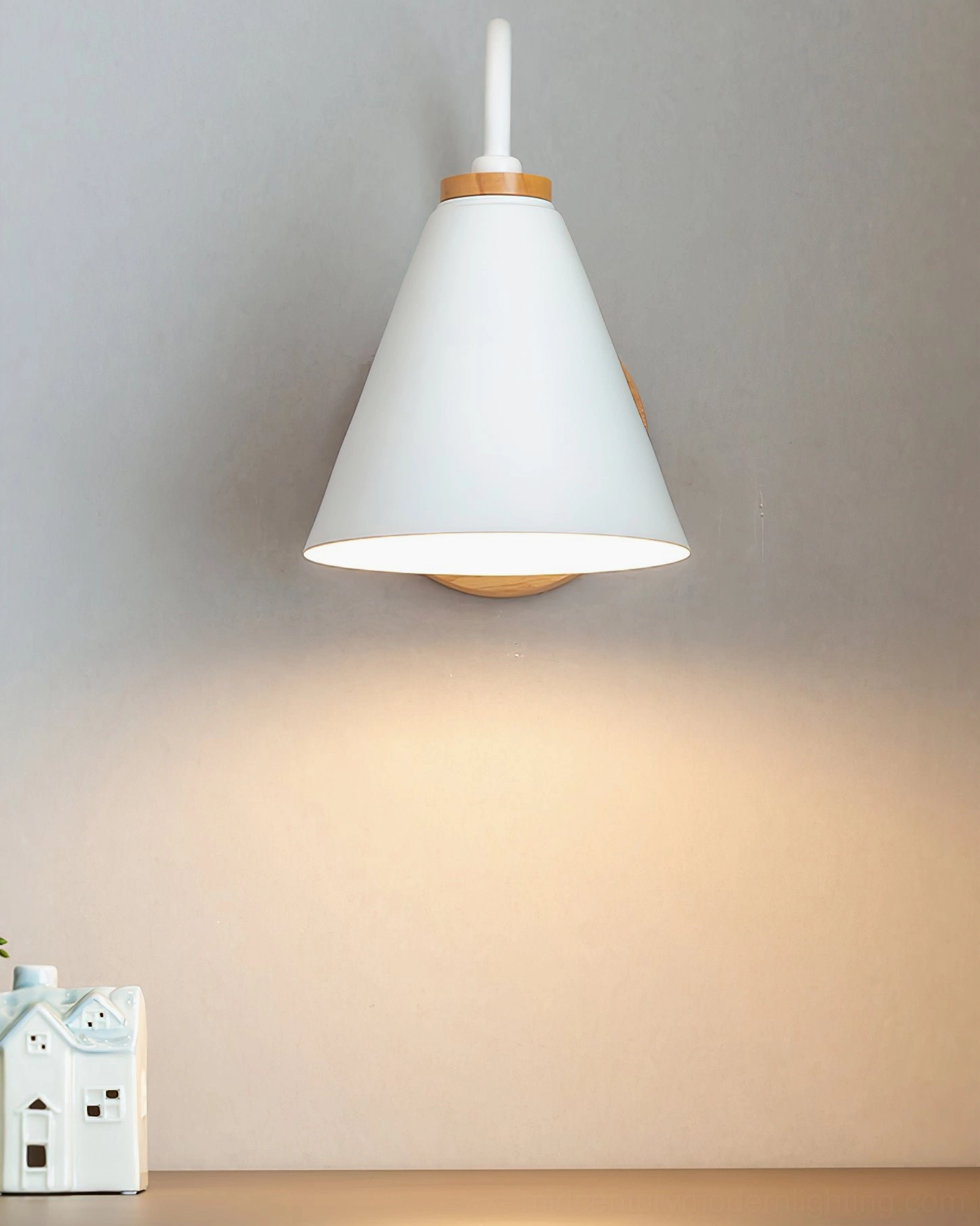 Kenji Nordic wall sconce in compact indoor desk setting with warm light creating ambient atmosphere and modern aesthetic