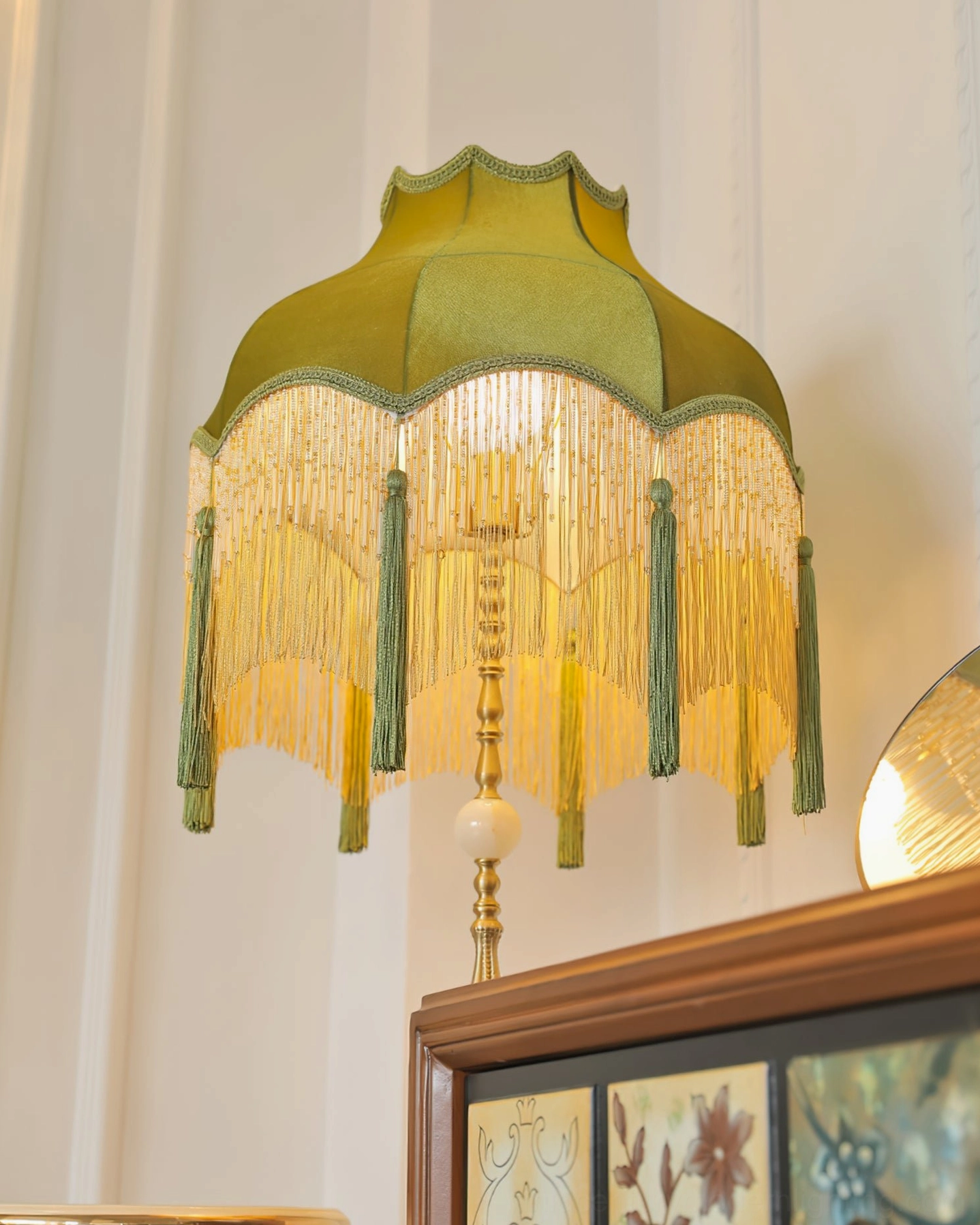 Kennedy green tassel floor lamp vintage home decor styling with complementary furniture and accessories