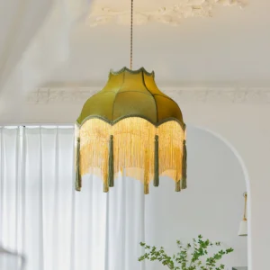 Kennedy fabric pendant lamp illuminated in French-style living room with sheer curtains and period furnishings