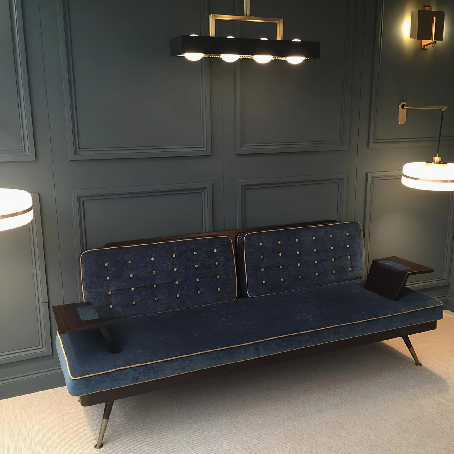 Black and gold Kernel pendant light above luxury living room with tufted sofa