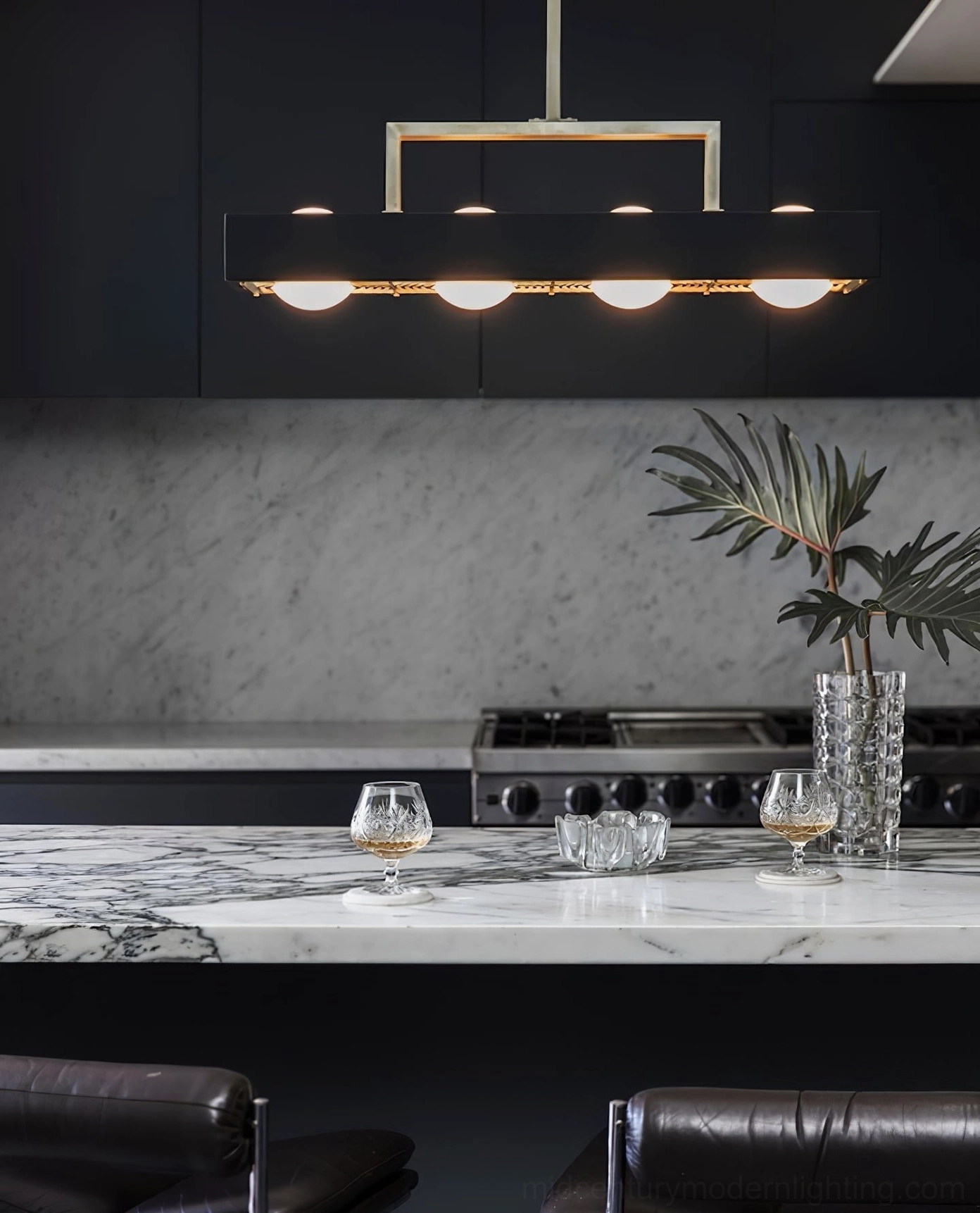 Kernel modern pendant light fixture showing laser-cut metal diffuser and glass sphere construction