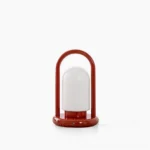 Kero cordless portable table lamp with red metal frame and frosted glass shade, front view on white background