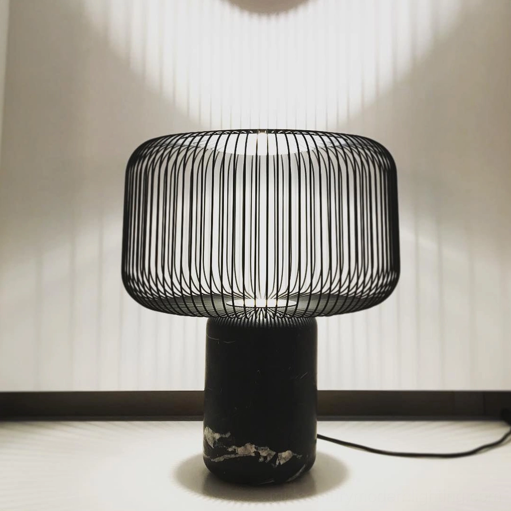 Keshi marble lamp on entryway console creating sophisticated lighting statement piece