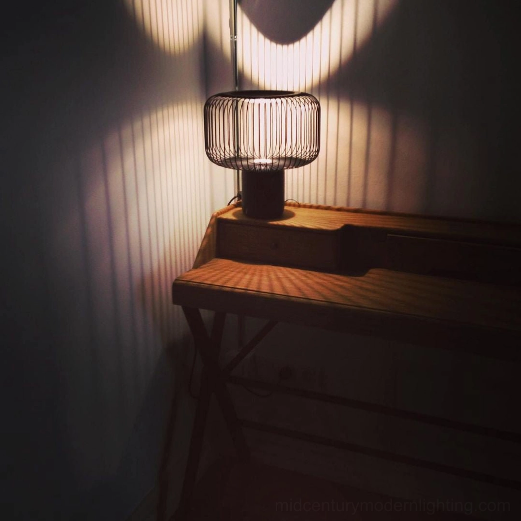 Keshi table lamp shadow play on wall showing geometric pattern and architectural lighting effect