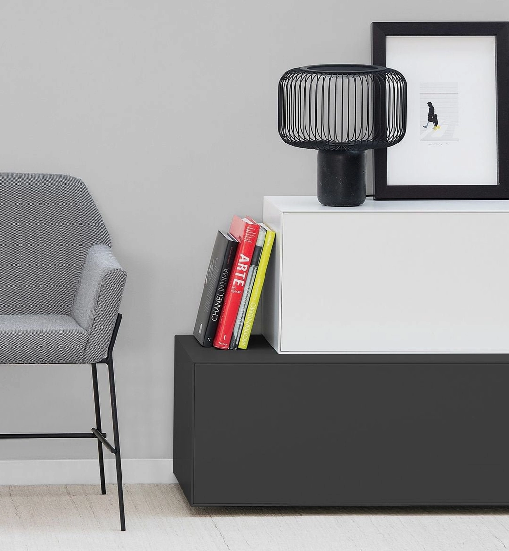 Keshi table lamp showing integrated LED warmth and mirror reflector light distribution