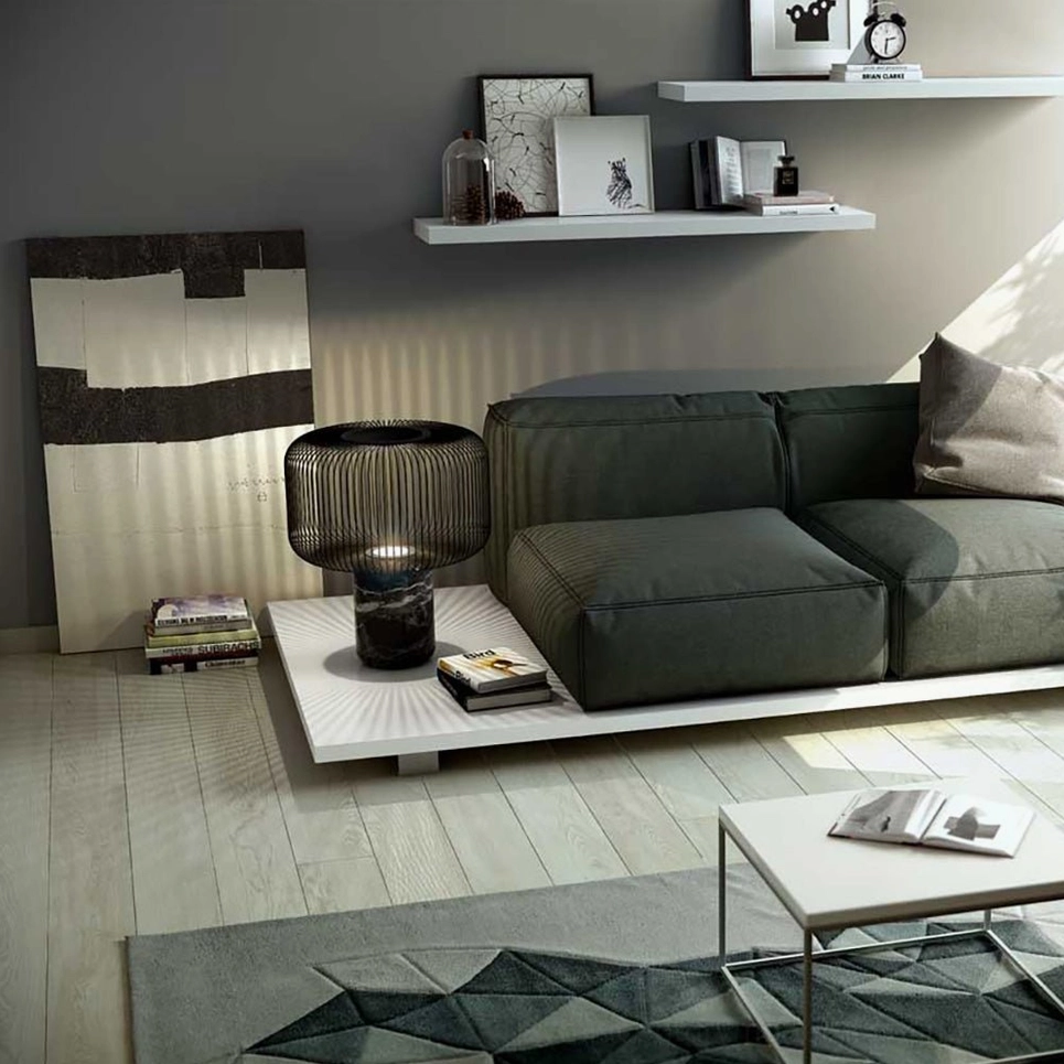 Keshi table lamp on luxury console showing matte black finish and natural marble veining detail