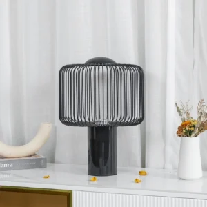 Keshi table lamp three-quarter view on luxury living room console with dried flowers and decorative accessories