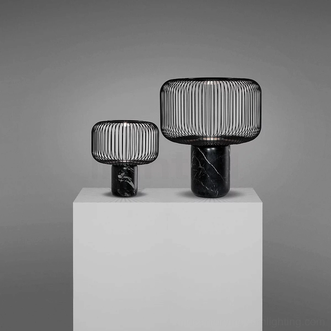 Keshi lamp on office desk with modern workspace creating architectural shadow effect