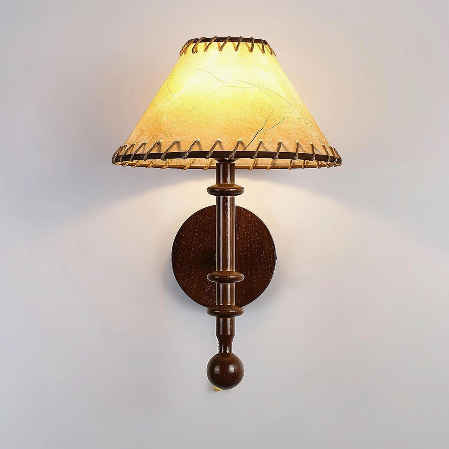 Kibo handcrafted fabric shade wall sconce detail showing intricate stitching and material texture