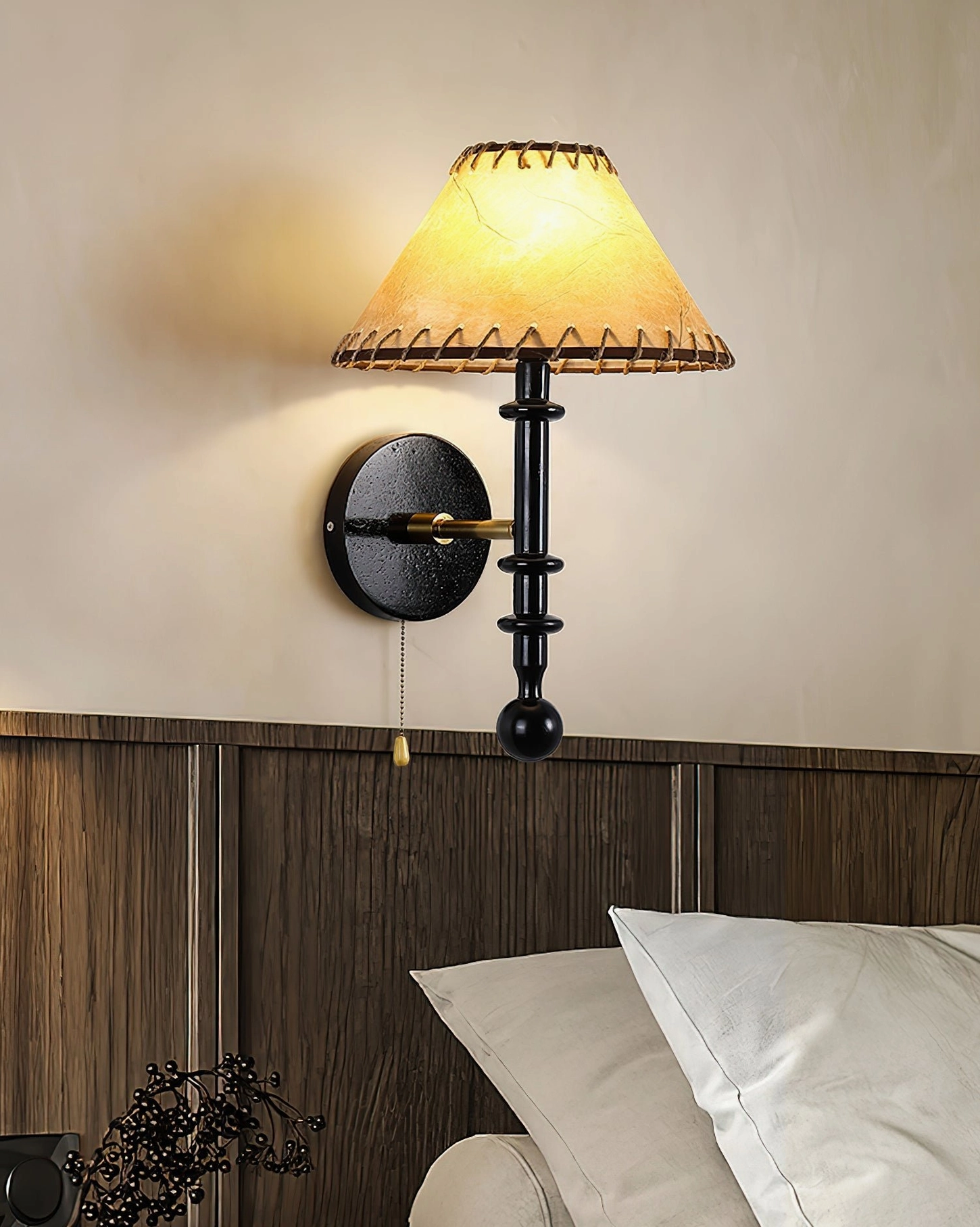 Kibo mid-century wood wall sconce mounted above wooden bed headboard with white bedding and modern bedroom design