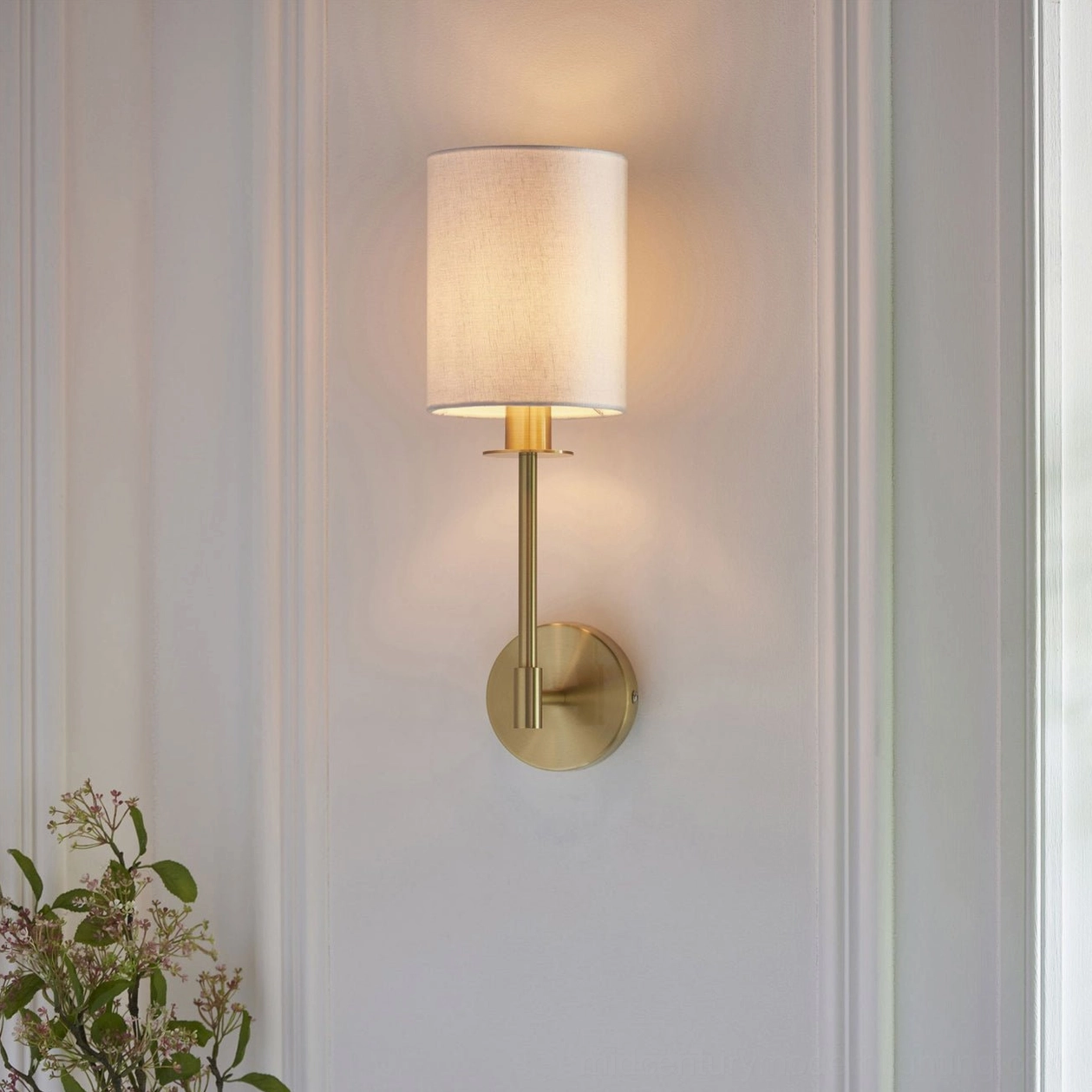 Kington sconce mounting hardware close-up showing round brass plate and metal rod connection detail