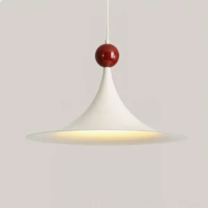 Close-up front view of Kinvara mid-century modern pendant light showing flared white shade and red top detail