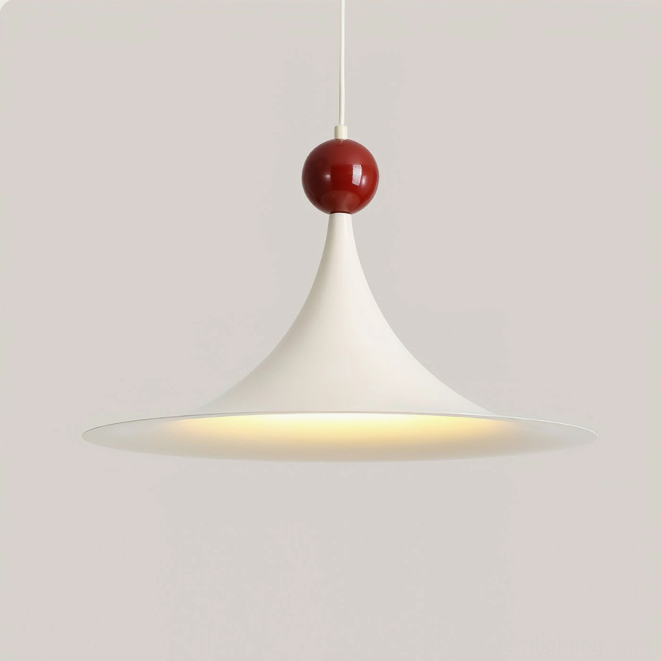 Close-up front view of Kinvara mid-century modern pendant light showing flared white shade and red top detail