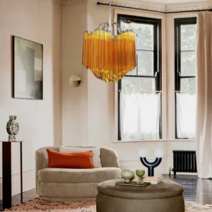 Kite amber glass pendant light installed in modern cozy living room with bay window