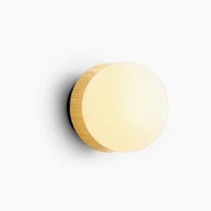 Knock minimalist round wall lamp with satin opal glass diffuser, frosted glass finish, front view studio shot