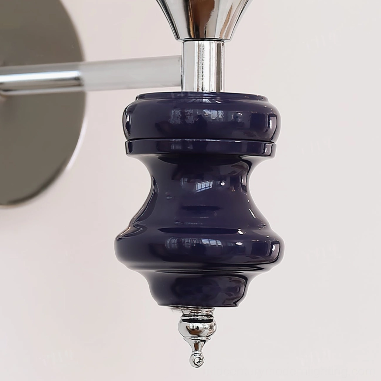 Koscina ceramic base detail - deep blue glossy finish with chrome decorative finial close-up photography