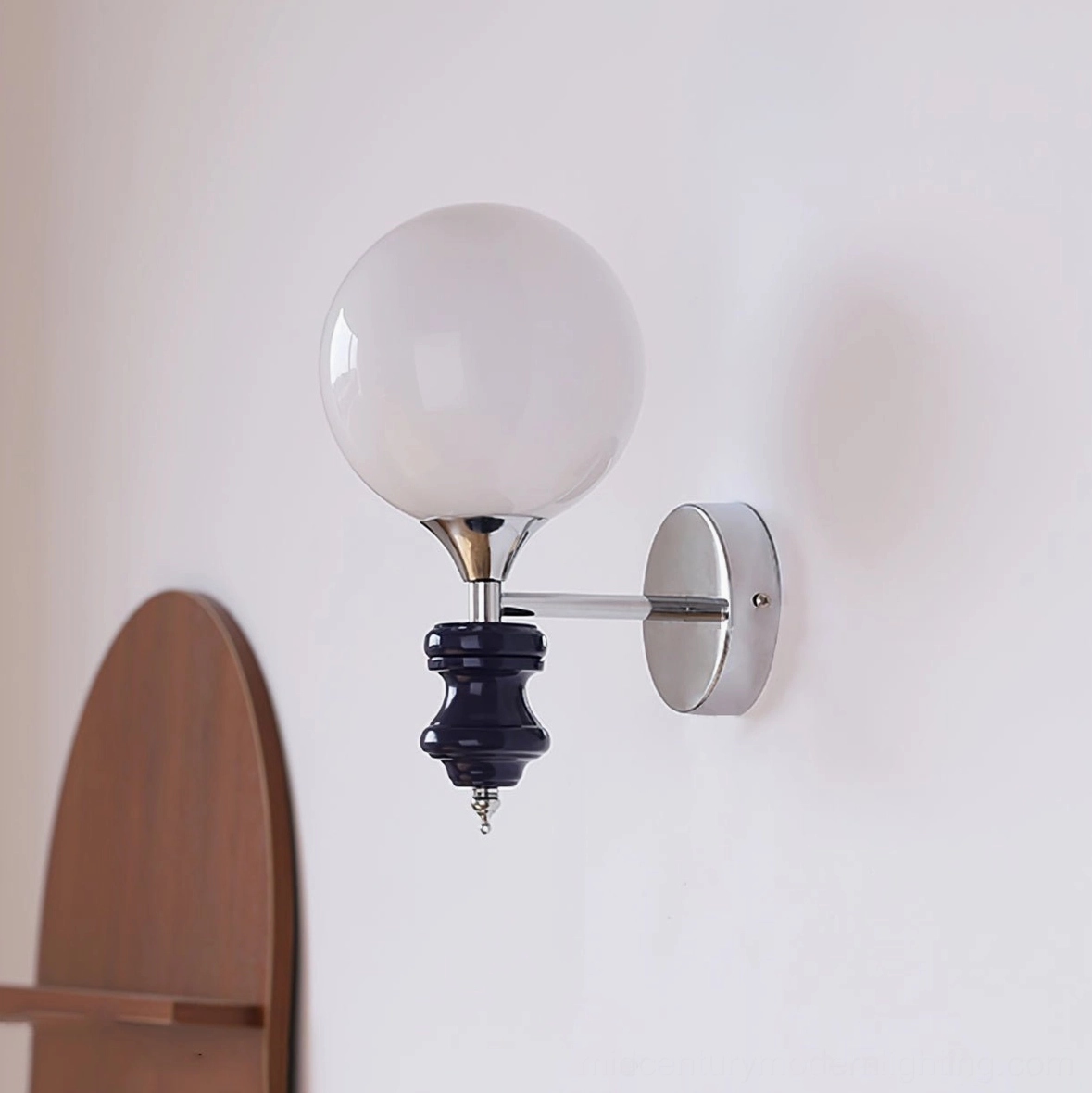 Koscina wall sconce - G9 bulb socket and chrome hardware mounting detail close-up