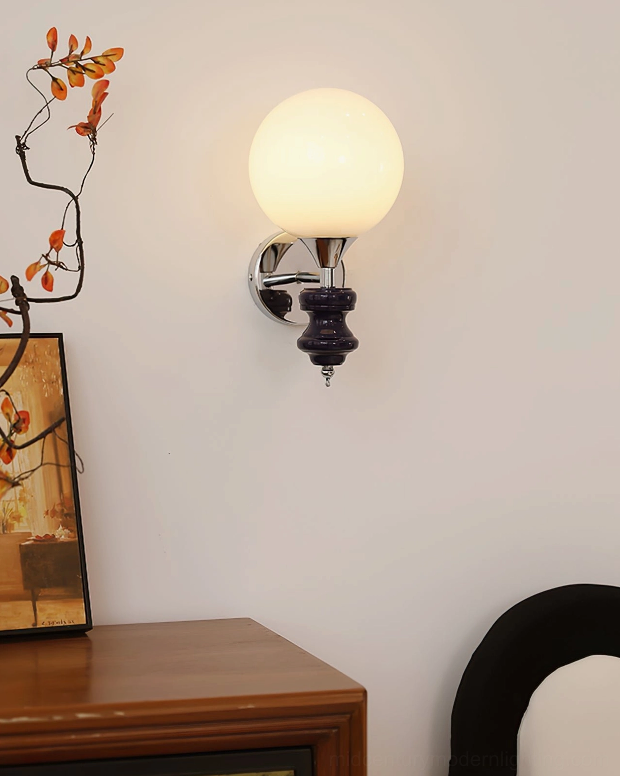 Koscina minimalist wall sconce - complete fixture profile showing base, arm, and globe shade proportions