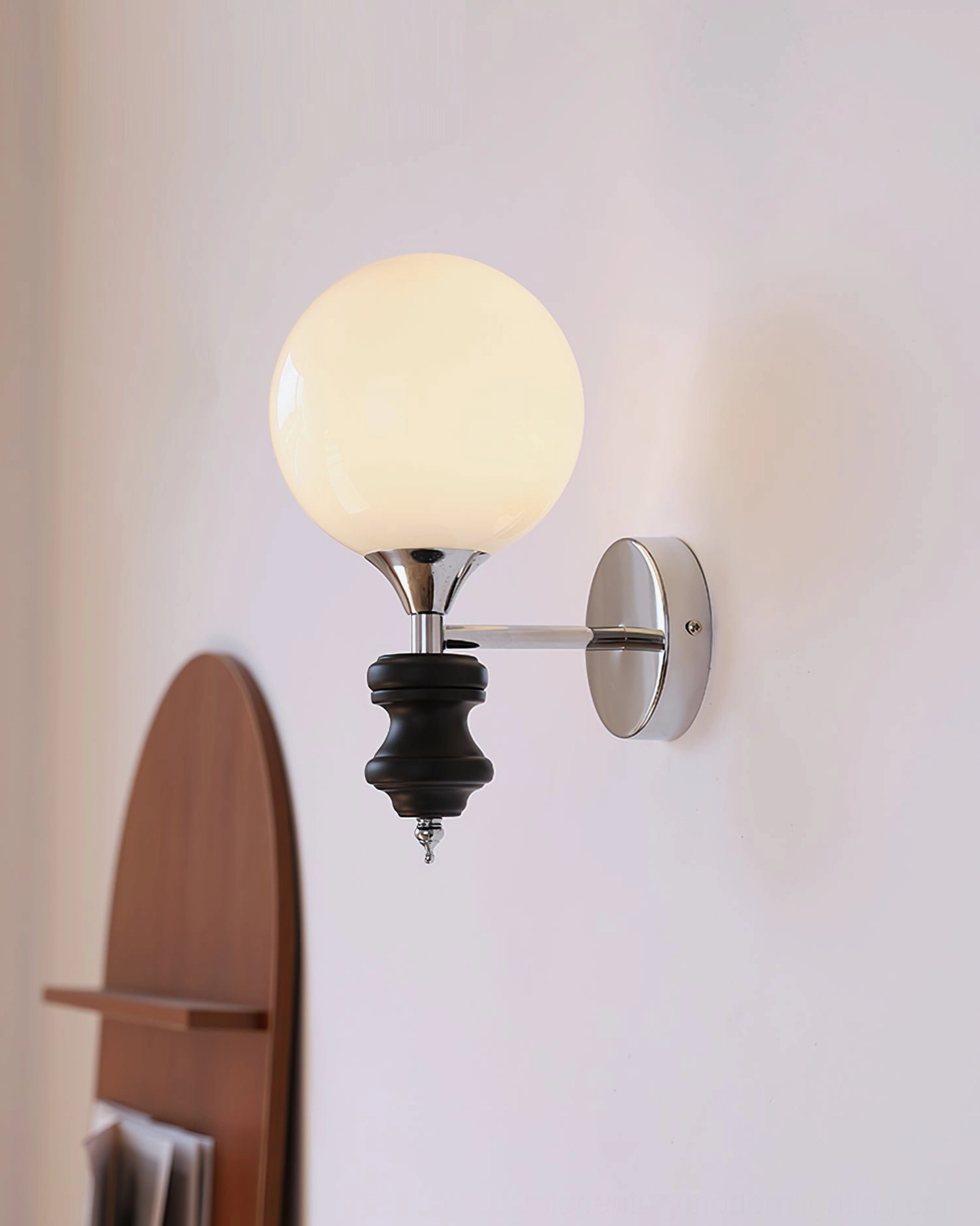 Koscina globe wall lamp - paired installation showing symmetrical mounting in modern interior space