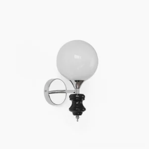 Koscina globe wall sconce front view - frosted white glass sphere with ceramic base and polished chrome hardware in studio lighting