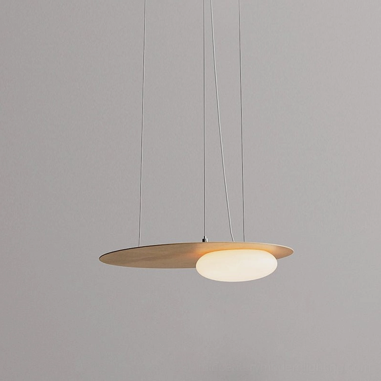 Brushed gold Kwic pendant light in compact size, mid-century modern styling with warm illumination