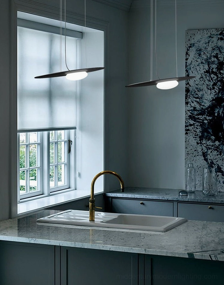 Kwic disc pendant light with pure white metal frame and blown glass diffuser, front view studio photography