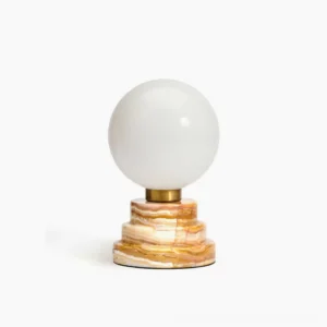 Lakeville table lamp with frosted glass globe and onyx marble stepped base, frontal studio view