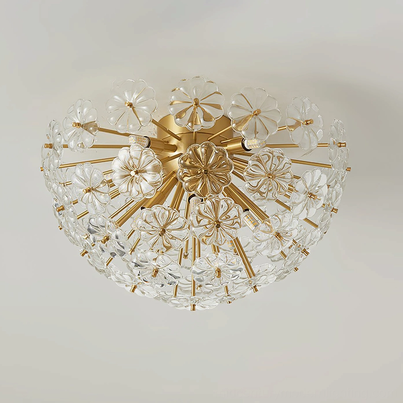 Lamina ceiling light artistic view showing glass petals and brass metalwork craftsmanship