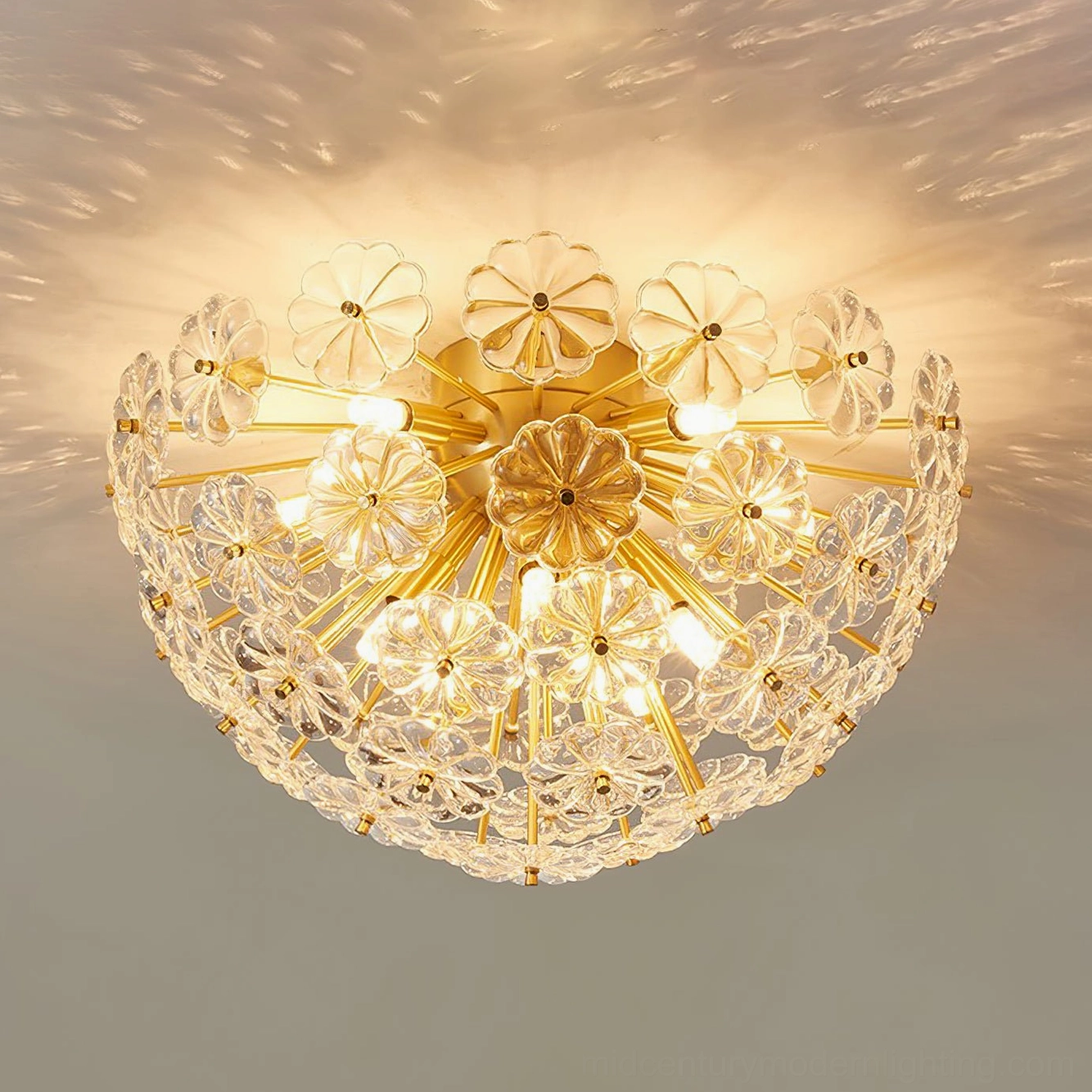 Lamina ceiling light close-up detail showing brass hardware and textured clear glass petals with visible bulb