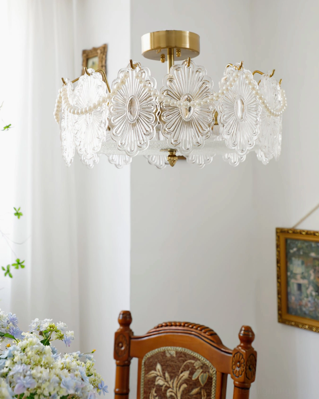 Lamina carved glass petal lamp in vintage French dining area aesthetic