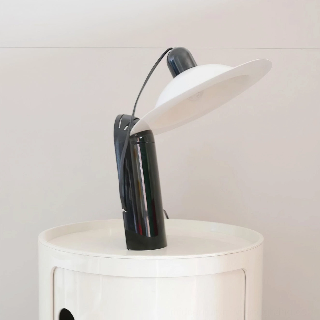 Lampiatta table lamp detail showcasing aluminum alloy shade slot mechanism for multiple light inclination positions