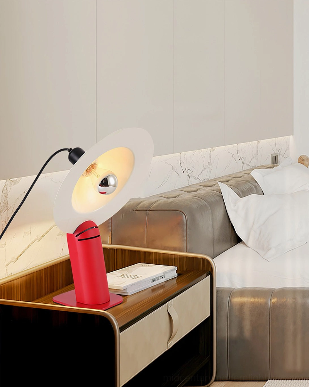 Lampiatta disc table lamp in white finish with metal base and smooth rotational joint for precision light positioning