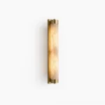 Langham alabaster wall sconce front view studio shot on white background, showing cylindrical natural stone column with brass backplate