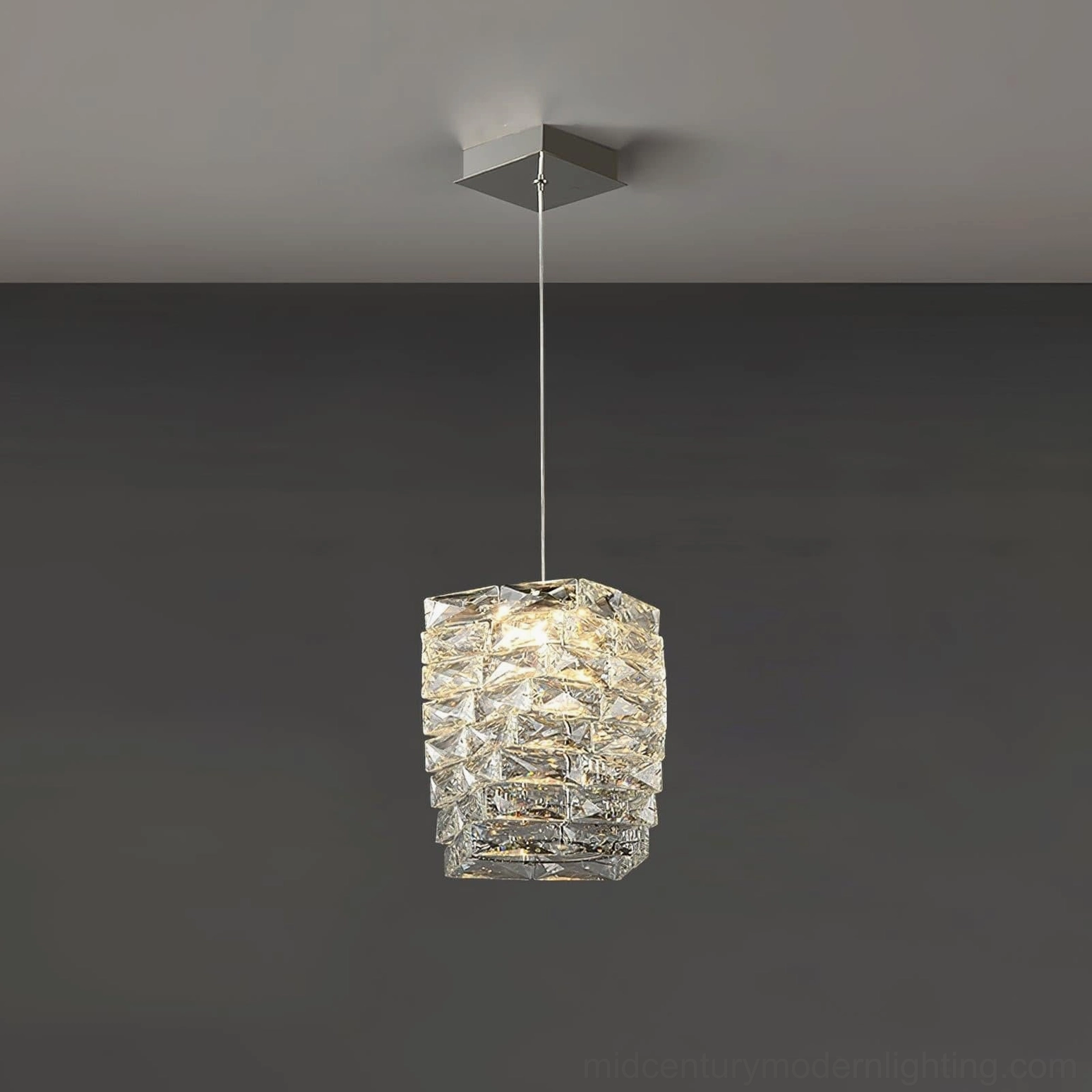 Large-sized faceted crystal pendant lamp showing expanded geometric proportions and substantial presence