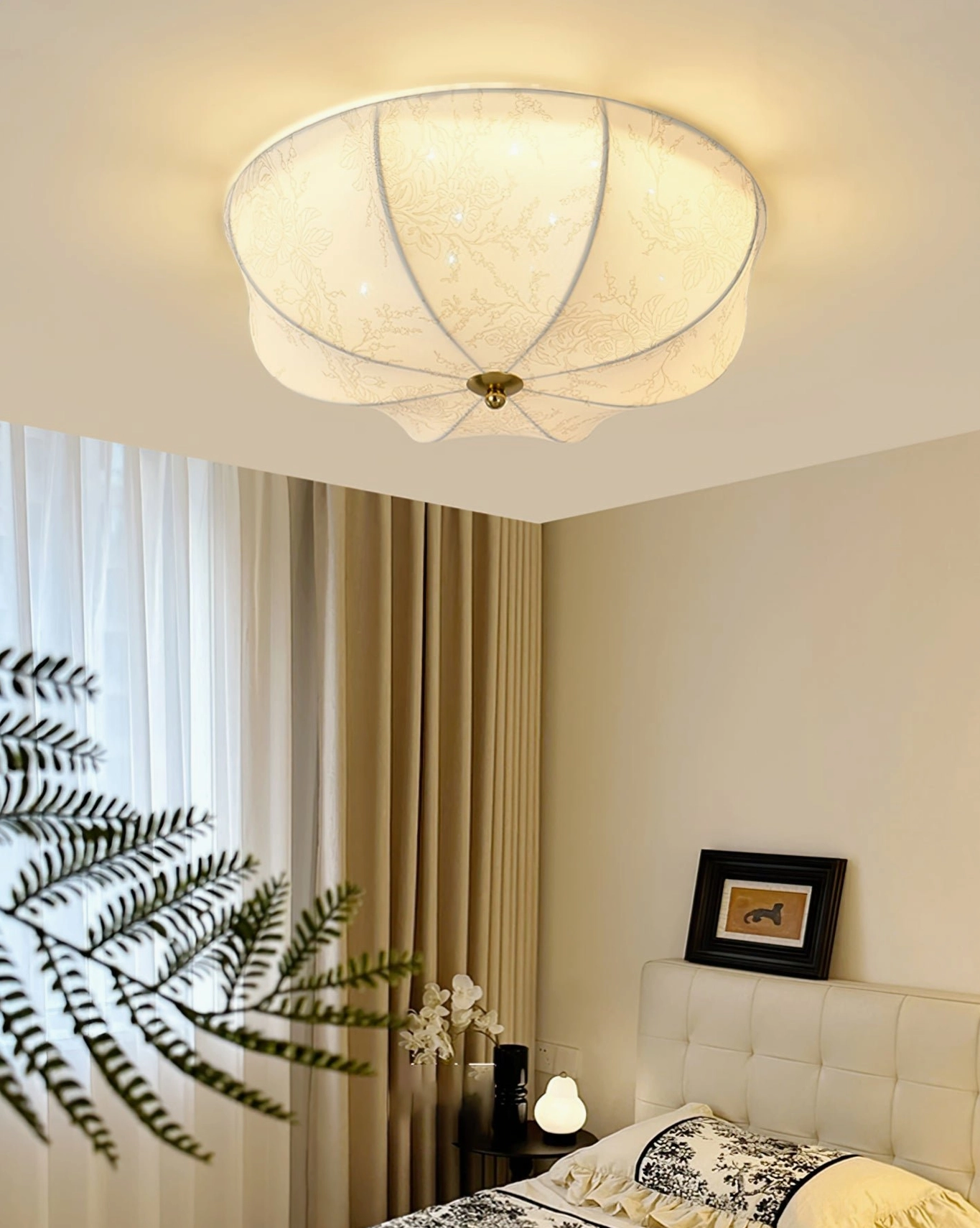 Large orchid fabric ceiling light creating statement piece ambiance in spacious master suite or entryway with botanical style