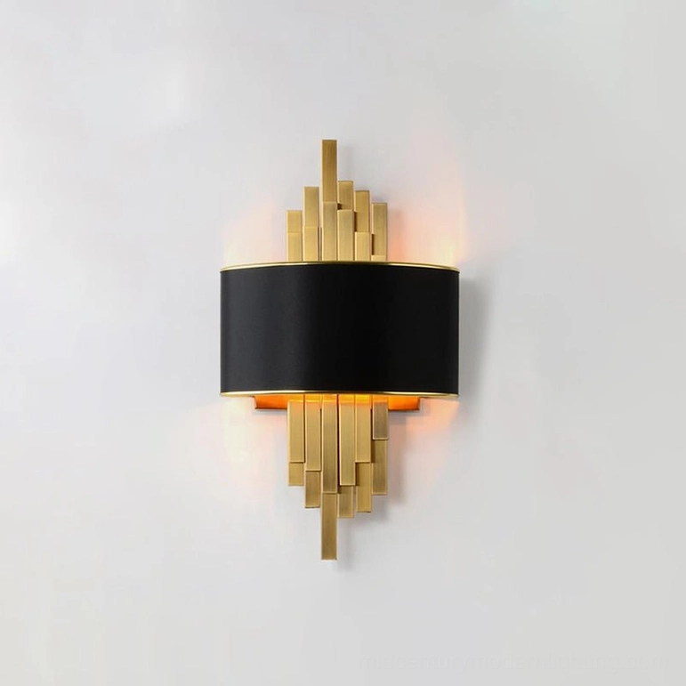 Laurina black wall sconce detail shot showing brushed gold metal framework and dark fabric shade